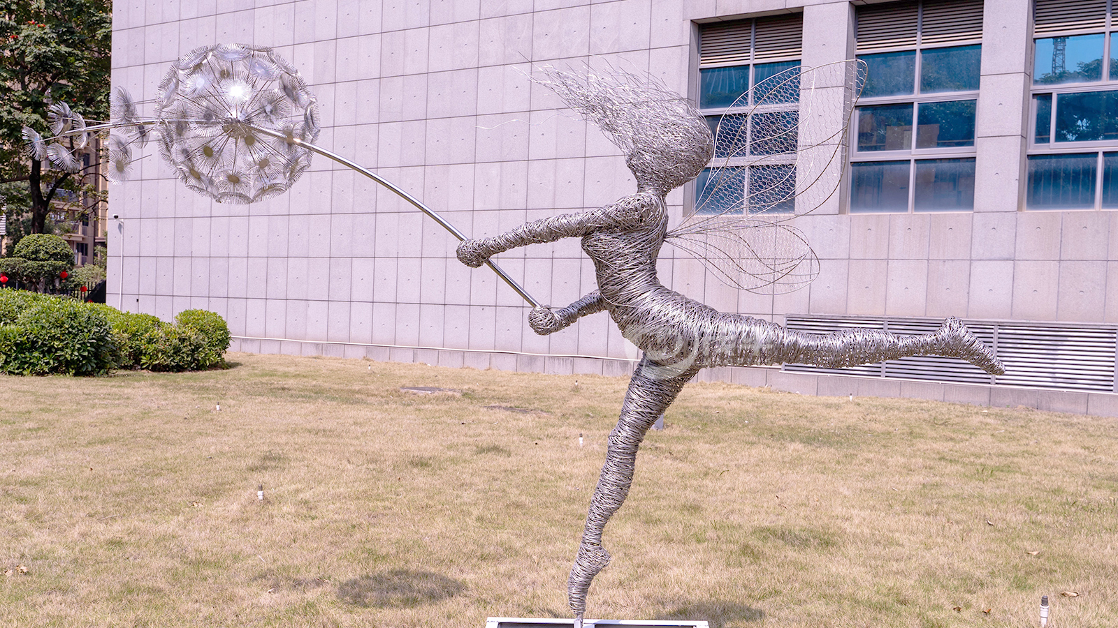 dandelion girl sculpture