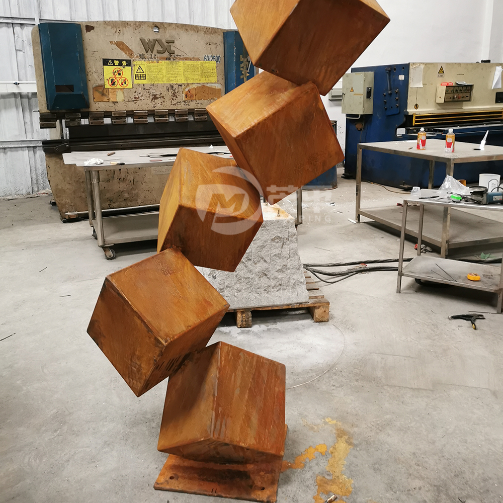 corten steel cube sculpture